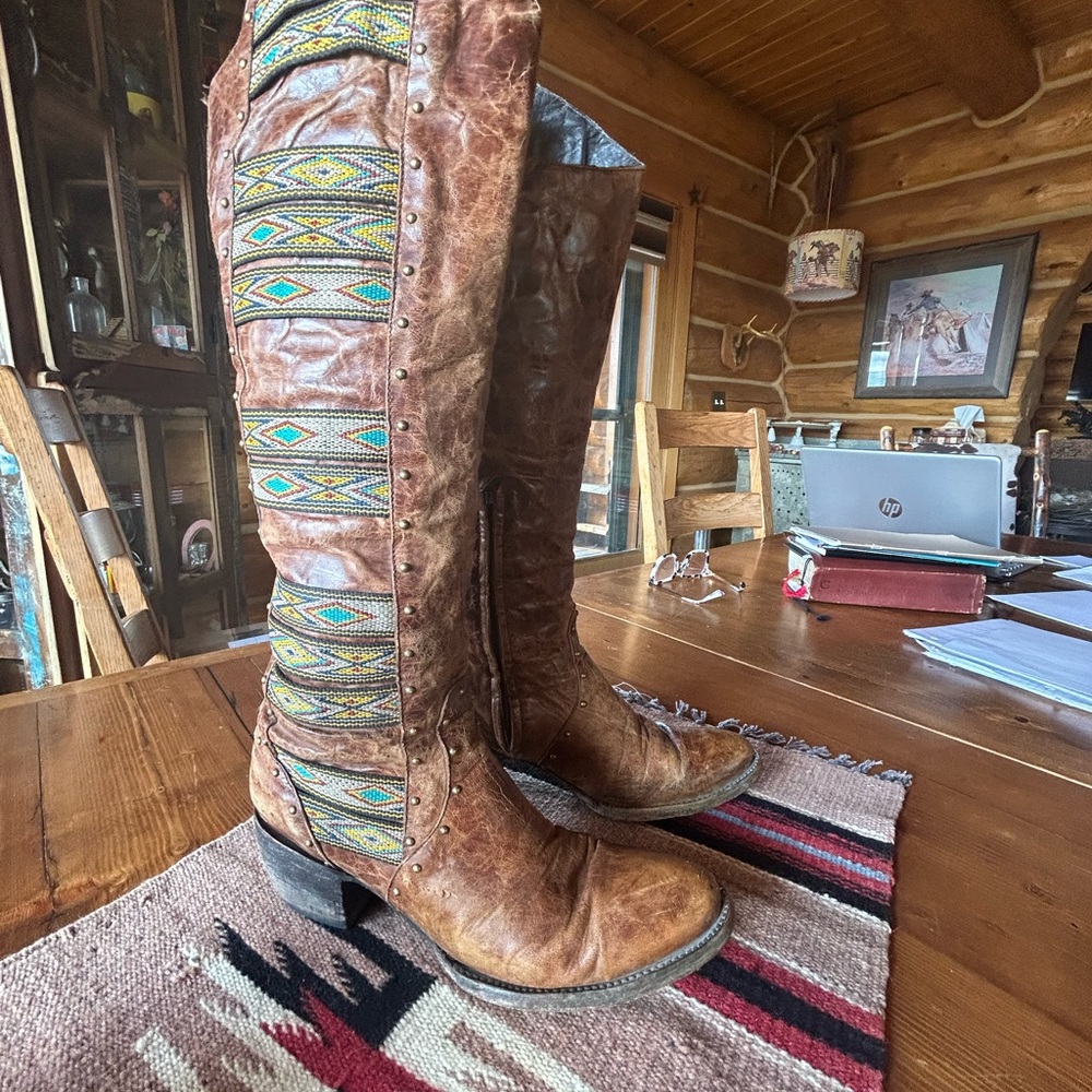Brown Leather Knee-High Boots with Patterned Accents